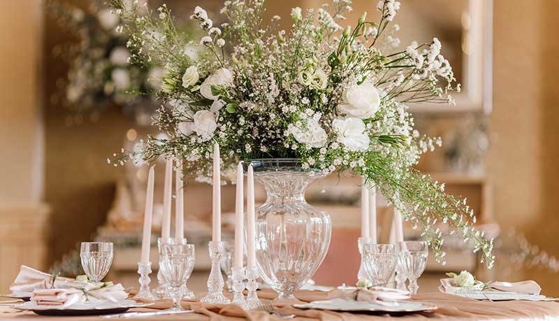 Incorporate greenery in your wedding flowers to save money.